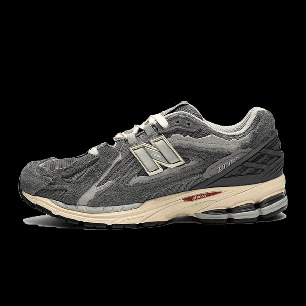 Stylish New Balance 1906D sneakers in a modern Protection Pack Castlerock colorway.