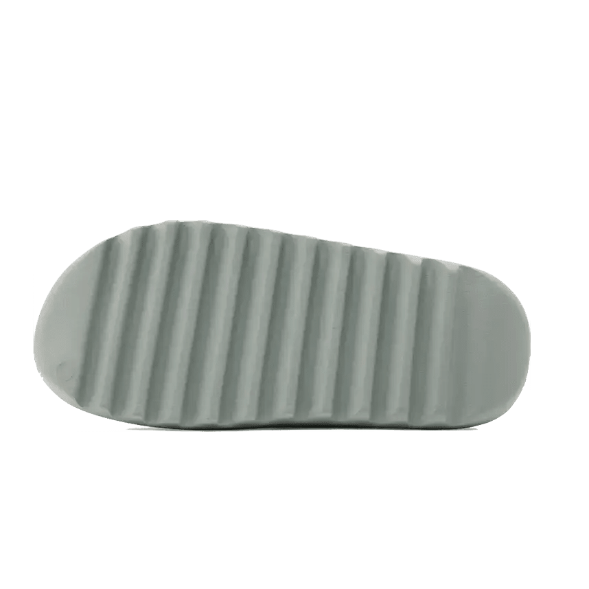 Grijze Adidas Yeezy Slide Salt-slippers met een gerimpeld oppervlak