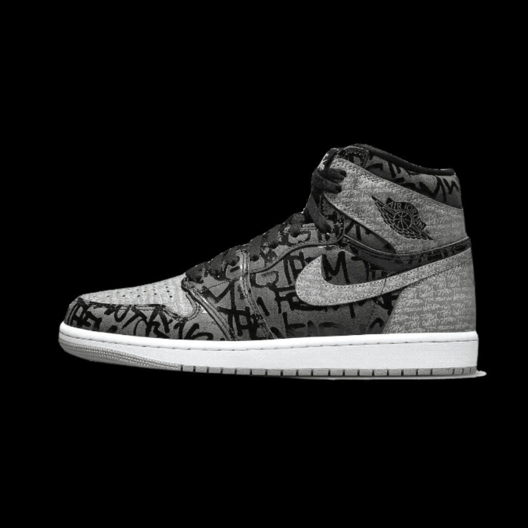 Grijze en zwarte Nike Air Jordan 1 High OG Rebellionaire sneakers op groen oppervlak