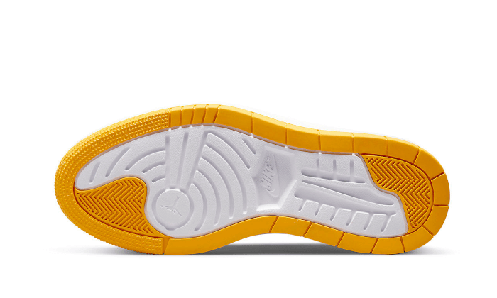 Elegante en sportieve lage sneaker in geel en grijs. Zool met geribbelde profielen voor extra grip. Onmisbaar accessoire voor een stijlvolle en comfortabele look.