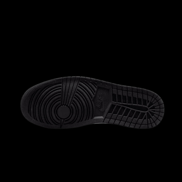 Zolen van Nike Air Jordan 1 Low OG Bleached Coral sneakers tegen een groene achtergrond