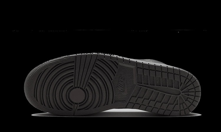 Zwarte Air Jordan 1 Low SE Craft sneaker met rode accenten. Ergonomisch profiel voor optimale demping en grip.