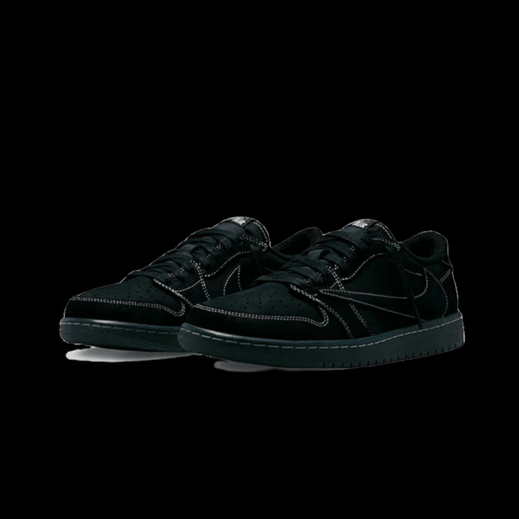 Zwarte Air Jordan 1 Low SP Travis Scott sneakers op groene achtergrond