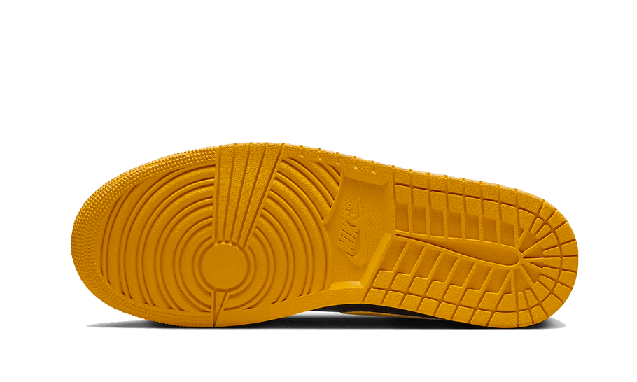 Gele Nike Air Jordan 1 Low sneakers, met stijlvolle ribbenstructuur en robuuste zool voor een duurzame look en optimaal comfort.