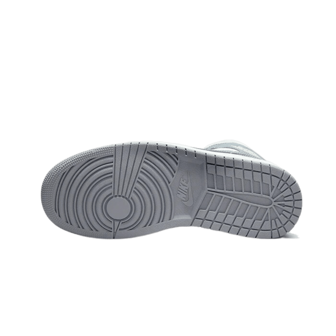 Moderne, grijze sneaker van Nike met opvallende details op de zool