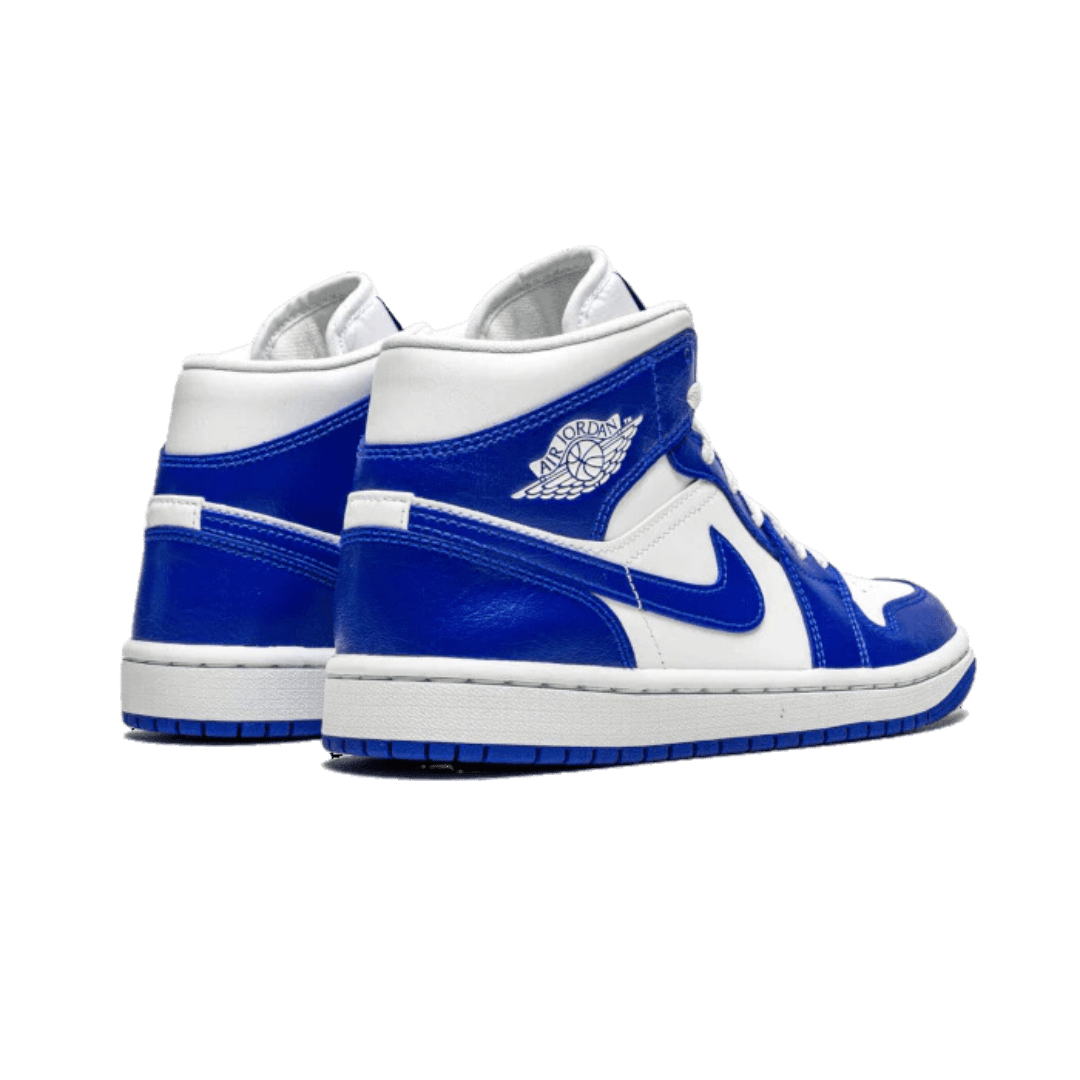 Blauwe en witte Nike Air Jordan 1 Mid Kentucky sneakers