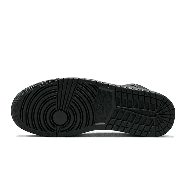 Zwarte Nike Air Jordan 1 Mid sneakers met hun kenmerkende profiel