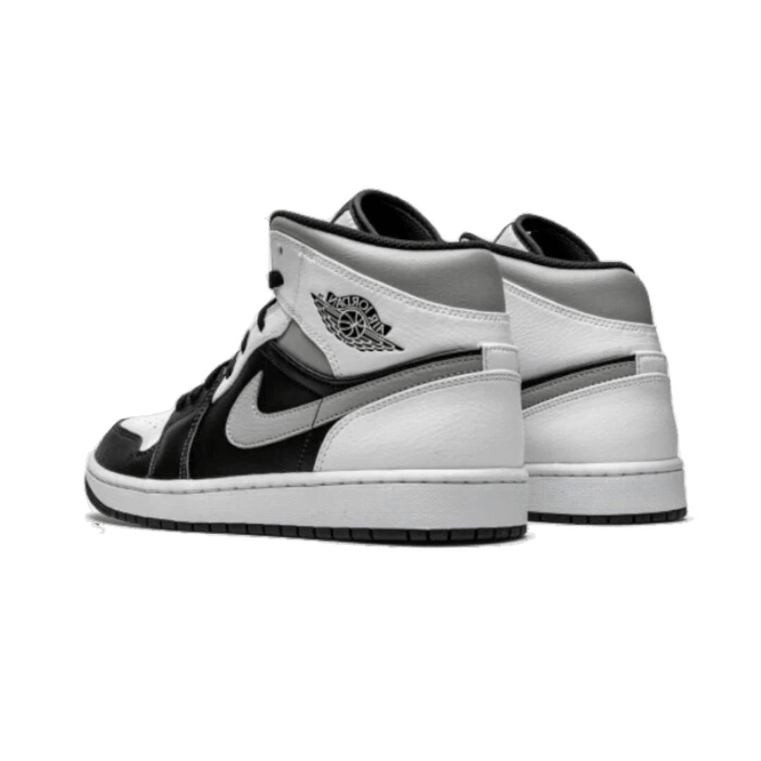 Elegante Nike Air Jordan 1 Mid White Shadow sneakers toont de klassieke stijl en technologie van deze populaire basketbal-iconische sneaker