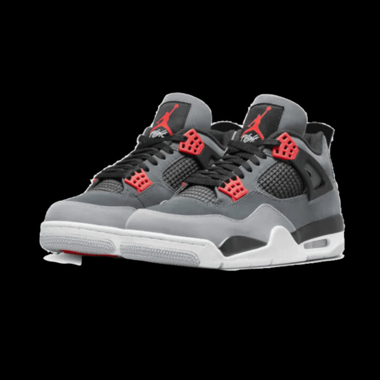 Exclusieve Air Jordan 4 Infrared (2022) sneakers op een egale groene achtergrond. Deze populaire basketbalschoenen van Nike hebben een zwart, grijs en rood design met een opvallend Air Jordan-logo.