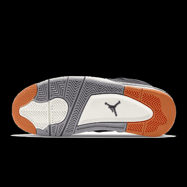Stijlvolle Air Jordan 4 SE Starfish sneakers op een groene achtergrond