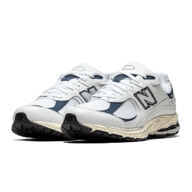 Witte New Balance 2002R sneakers met marine accenten