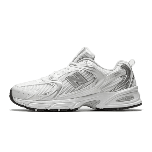 Witte New Balance 530 Munsell sneakers op groene achtergrond