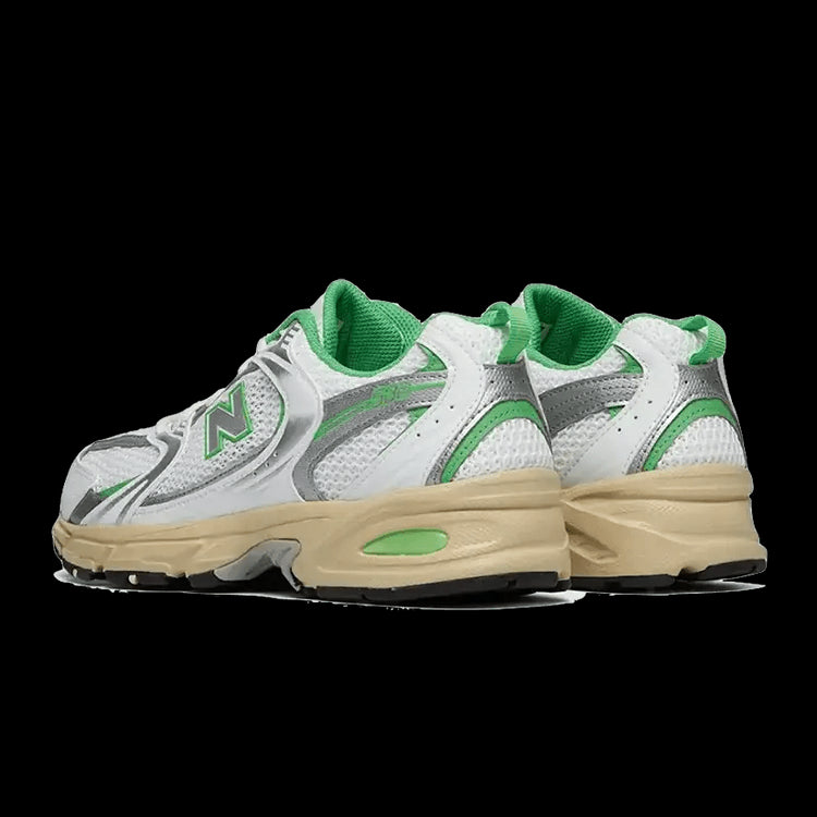Nieuwe Balance 530 White Palm Leaf sneakers - stijlvolle sportieve schoenen met wit, grijs en groen design en duurzame zool.