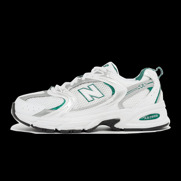 Witte New Balance 530 sneaker met zilveren en groene accenten