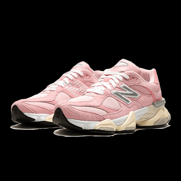 Stylish New Balance 9060 crystal pink sneakers showcasing a modern design with pastel hues and a sleek silhouette.