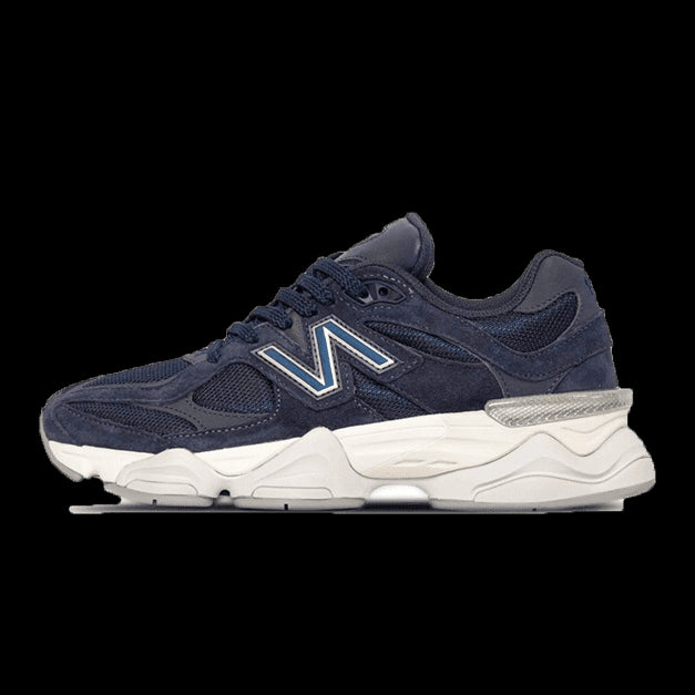 Navy blue New Balance 9060 sneakers showcased on a plain background