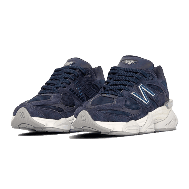 Sleek navy New Balance 9060 sneakers from Sole Central, a leading destination for exclusive footwear. These stylish trainers feature a durable, modern design with a comfortable sole for all-day wear.