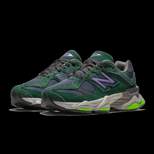 Groene New Balance 9060 Nightwatch sneakers met paarse en lichtgroene accenten op een effen groene achtergrond, aangeboden door Sole Central, de ultieme bestemming voor exclusieve sneakers.
