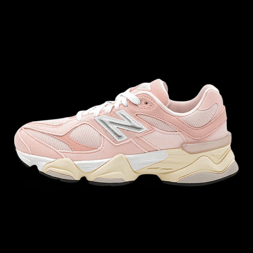 Stylish pink and white New Balance 9060 sneakers featuring a sleek, textured design and a sturdy sole from Sole Central, the ultimate destination for exclusive sneakers.