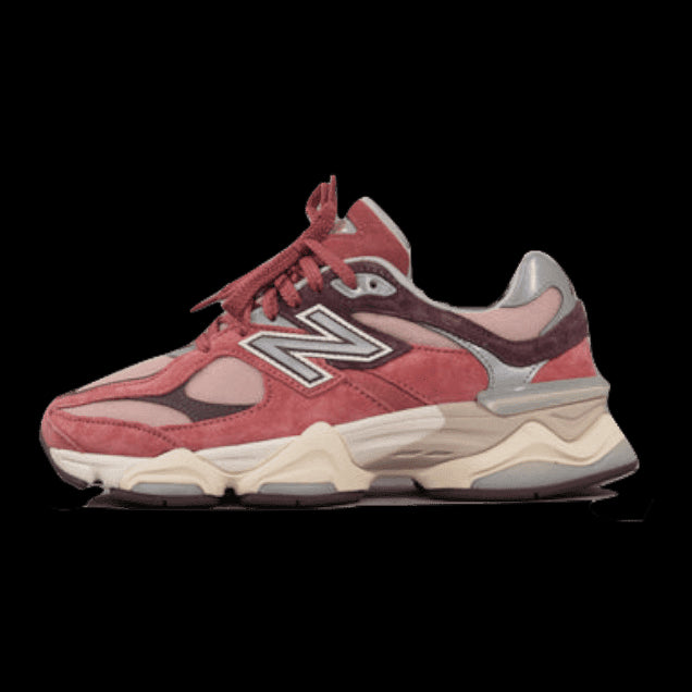 Pink and grey New Balance 9060 sneakers with a sea salt and cherry blossom inspired design, displayed against a plain background.