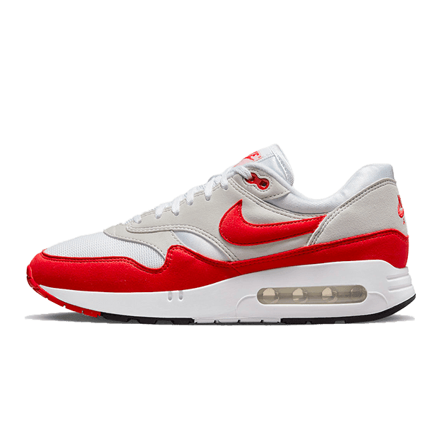 Klassieke Nike Air Max 1 '86 Big Bubble sneakers in een stijlvolle kleurencombinatie van grijs en rood. Deze iconische sneakers staan bekend om hun comfortabel demping-systeem en trendy retro-design.