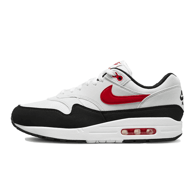 Exclusieve Nike Air Max 1 Chili 2.0 sneakers op donkergroene achtergrond