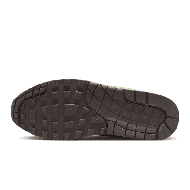 Donkergekleurde Nike Air Max 1-sneaker met opvallend rubberen zool voor optimale grip en demping