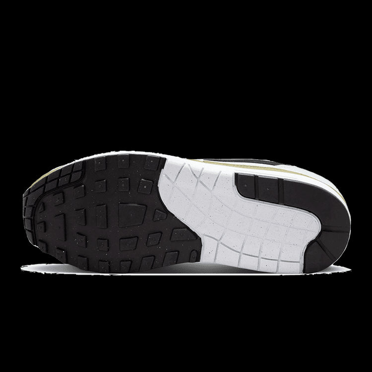 Moderne Nike Air Max 1 sneaker in wit, zwart en medium olijf met een robuuste profiel zool