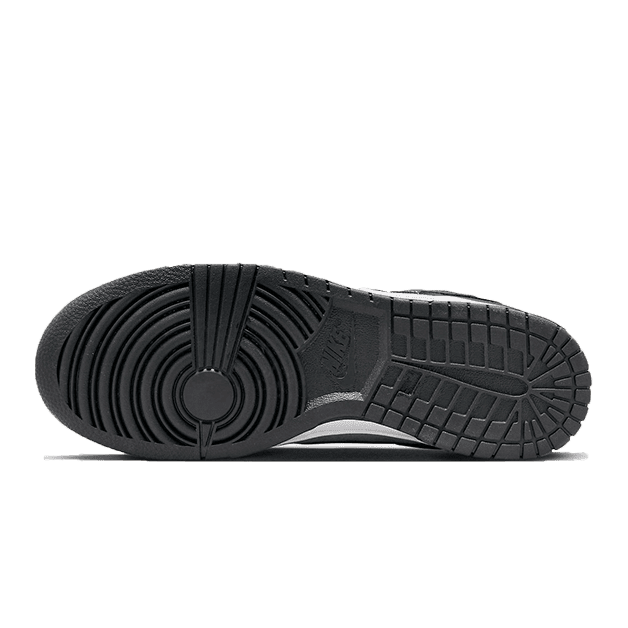 Donkere Nike Dunk Low sneakers met contrasterende grijze en groene accenten