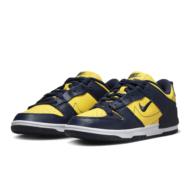 Elegante Nike Dunk Low Disrupt 2 Michigan sneakers in een stijlvolle combinatie van zwart en geel. Het sportieve, maar toch verzorgde ontwerp maakt deze sneakers een perfecte keuze voor elke modebewuste schoenliefhebber.