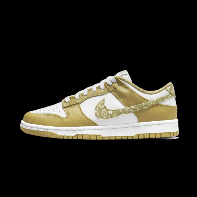 Stylish Nike Dunk Low Essential Paisley Pack sneakers in a vibrant yellow and white color scheme, with a classic low-top silhouette and iconic Swoosh branding.