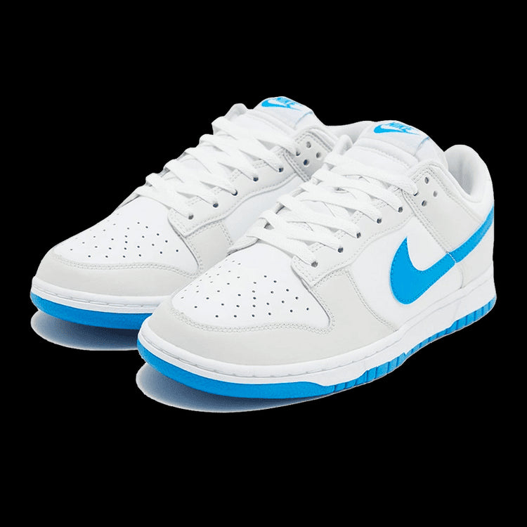 Witte Nike Dunk Low Retro Photo Blue sneakers met blauwe accenten