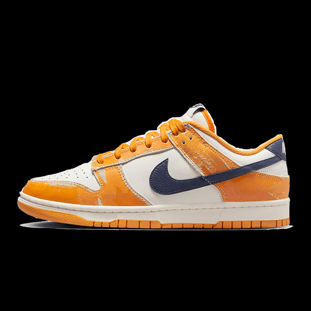 Oranje Nike Dunk Low sneakers met slijtage-effect
